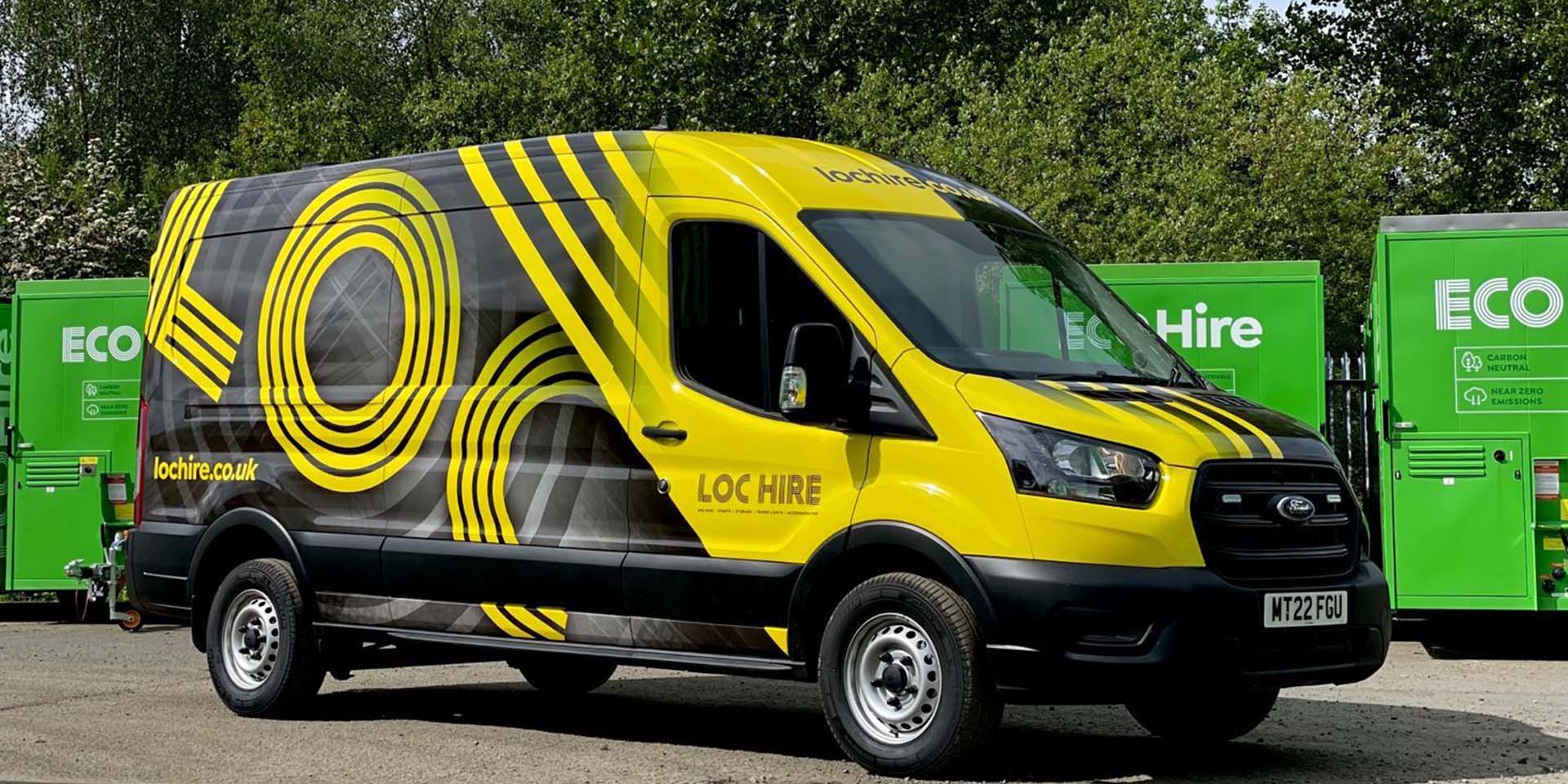 Branded van covered in a vehicle wrap.