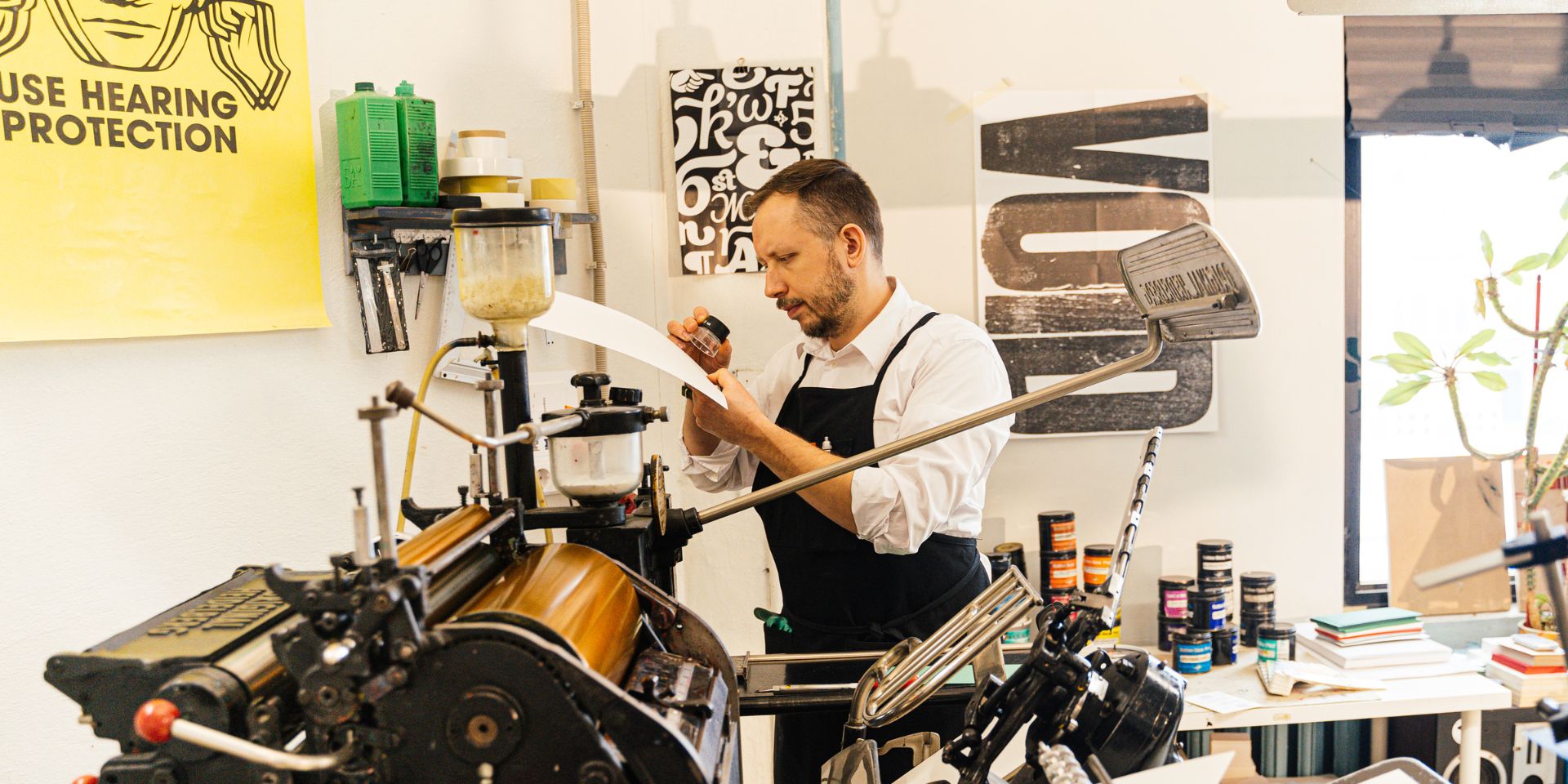 A print marketing professional at work in his workshop.